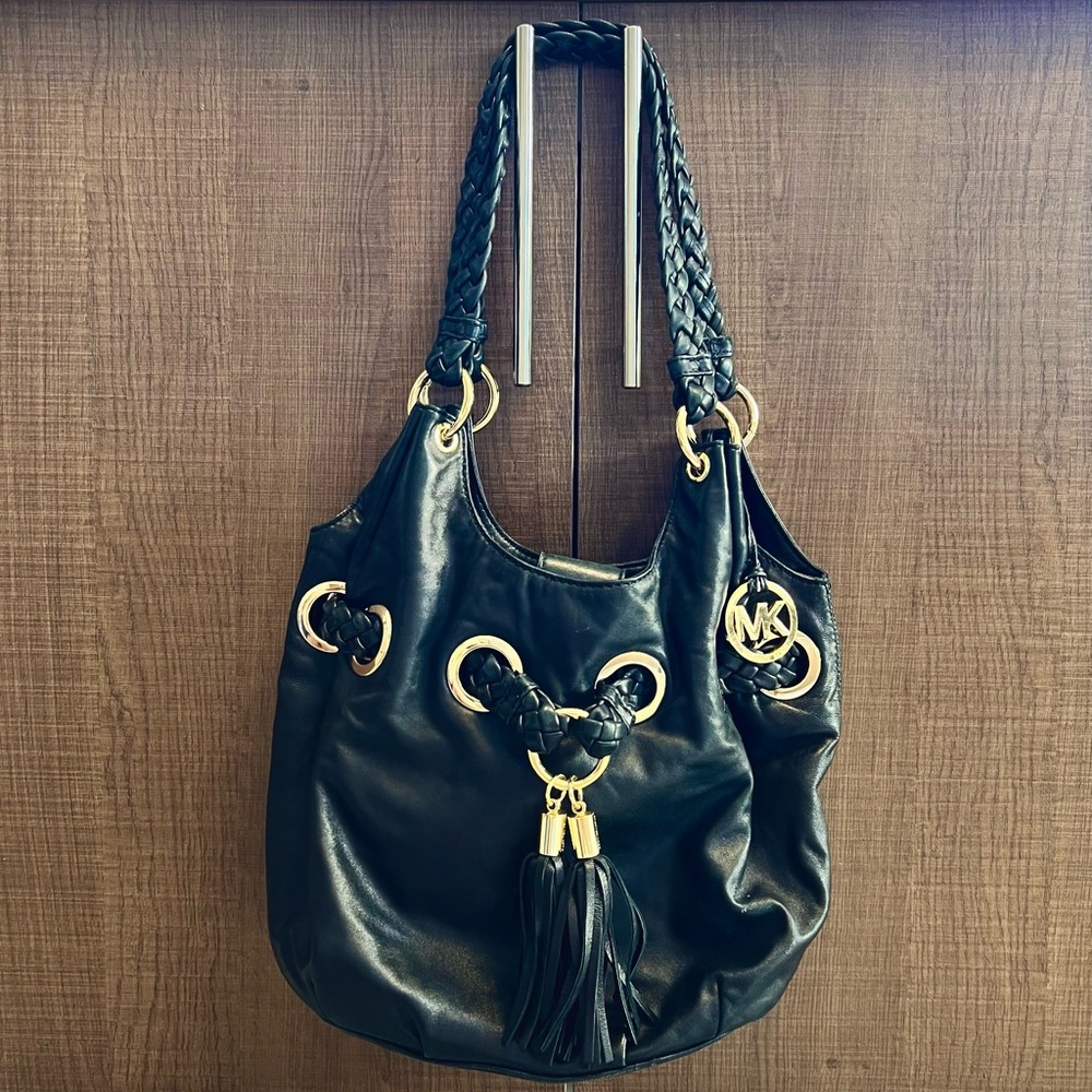 MICHAEL KORS SOFT BLACK LEATHER PURSE WITH BRAIDED STRAPS AND TASSELS